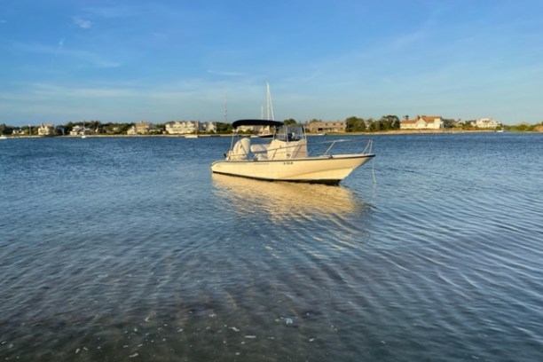 a small boat in a body of water